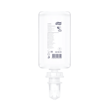 A clear, rectangular bottle of the mild scented foam soap Premium S4 (1000 ml) by TORK – Essity (520501) is shown upside down with a white cap, label, barcode, and product information. The pH-neutral foam soap is placed on a plain white background.