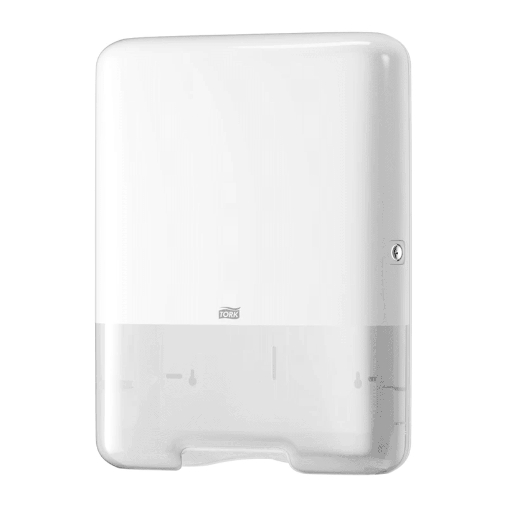 The Tork 553000 dispenser for zigzag towels Elevation H3 from Essity Professional Hygiene Germany GmbH offers an elegant rectangular design in white. It features a transparent lower section for easy monitoring of the towel supply and has a small lock on the right side that emphasizes its elevation design flair.