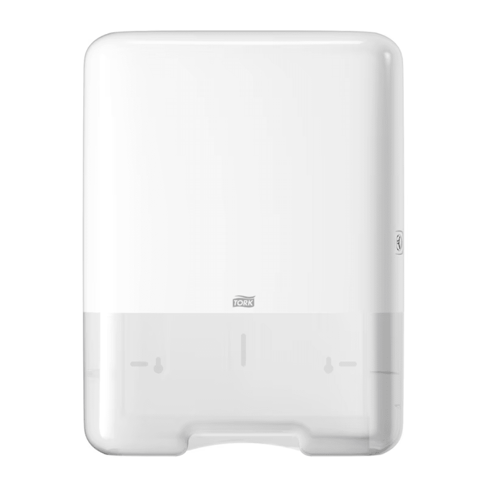 The Tork 553000 dispenser for zigzag towels Elevation H3 from TORK – Essity Professional Hygiene Germany GmbH is a white, wall-mounted paper towel dispenser with a sleek rectangular design and a discreet brand logo at the bottom center. It offers single sheet dispensing for efficient use and features a transparent section at the bottom for easy monitoring of the paper level.