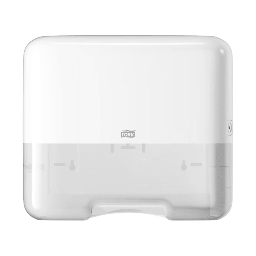 The Tork 553100 Mini Dispenser for Zigzag Hand Towels Elevation H3 by TORK - Essity Professional Hygiene Germany GmbH is a white, rectangular paper towel dispenser with a translucent lower part. It features a small logo in the center and embodies the simple, functional elegance characteristic of the Elevation design. This makes it ideal for the efficient dispensing of zigzag hand towels.