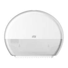 The Tork 555000 dispenser for Mini Jumbo Toilet Paper Elevation T2, manufactured by Essity Professional Hygiene Germany GmbH under the TORK brand, is a stylish, wall-mounted toilet paper dispenser in white with a transparent lower half. Its sleek semicircular design clearly displays the 'Tork' logo and is designed to effortlessly accommodate Mini Jumbo toilet paper.