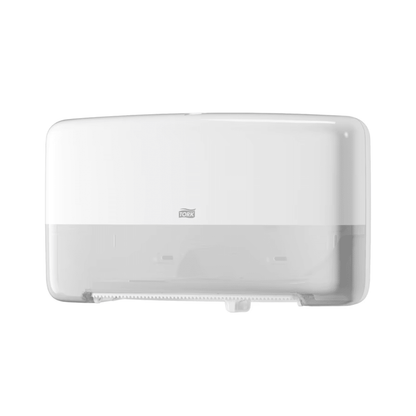 The Tork 555500 Twin Roll Dispenser for Mini Jumbo Toilet Paper T2 from TORK – Essity Professional Hygiene Germany GmbH features a transparent lower section that allows easy monitoring of the roll inside. Its sleek design includes a small logo on the front and a serrated edge for convenient tearing of paper towels.