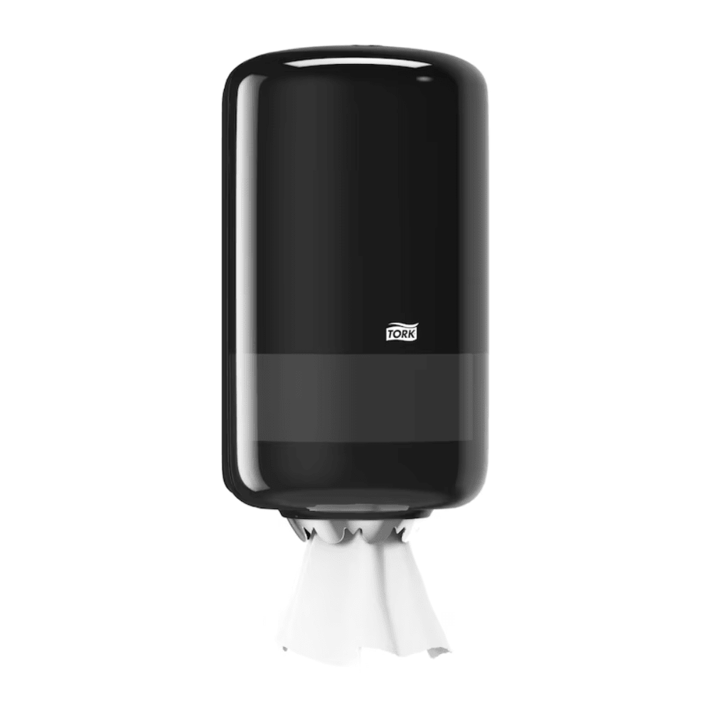 The stylish black Tork 558008 Mini Centerfeed Dispenser Elevation M1, wall-mounted, emphasizes the Elevation design with a white paper towel protruding from its base. The TORK logo is prominently placed in the center and effortlessly promotes better hygiene.