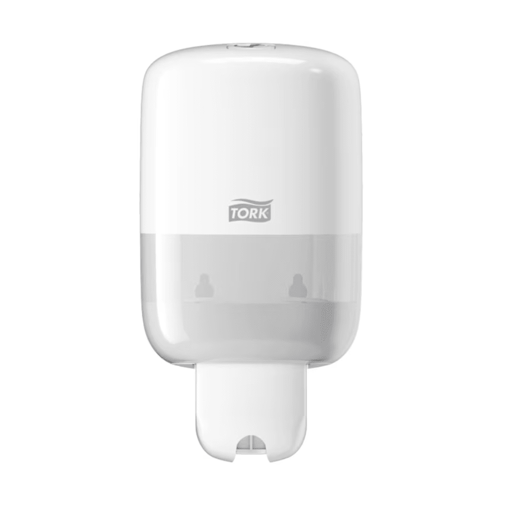 The Tork 561000 Mini Dispenser for Liquid Soap Elevation S2, manufactured by Essity Professional Hygiene Germany GmbH under the TORK brand, features a sleek and modern Elevation design with a transparent lower part for easy wall-mounting. The distinctive Tork logo is visible on the front, while the bottom contains an efficient dispensing slot.