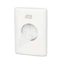 A Tork 566000 hygiene bag dispenser Elevation B5, designed for wall mounting, elegantly presents the brand 'TORK - Essity Professional Hygiene Germany GmbH' at the top. A bag is partially pulled out from the central opening, enhancing both comfort and style in your space.