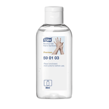 The Tork 590103 hand sanitizer gel premium bottle is made of clear plastic and has a white flip cap. The label includes the term "hand sanitizer gel," an image of hands, and states that it contains 80 ml with 80% alcohol. Instructions for surgical hand disinfection are included as a reference before use. The product is part of TORK by Essity Professional Hygiene Germany GmbH.