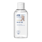 The Tork 590103 hand sanitizer gel premium bottle is made of clear plastic and has a white flip cap. The label includes the term "hand sanitizer gel," an image of hands, and states that it contains 80 ml with 80% alcohol. Instructions for surgical hand disinfection are included as a reference before use. The product is part of TORK by Essity Professional Hygiene Germany GmbH.