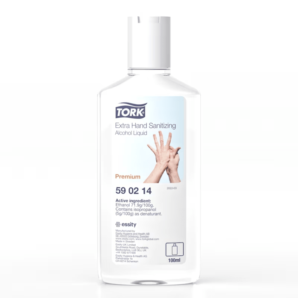 A 100 ml bottle of Tork 590214 Extra Disinfecting Hand Alcohol Liquid has a label that highlights hands and prominently displays ingredients like ethanol. The TORK logo is clearly visible, and a recycling symbol is subtly located at the bottom.