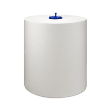 A large, cylindrical roll of white paper towel with a blue center spool stands upright against a plain white background. The Tork Matic® 290059 extra-long roll towel Universal H1 1-ply by TORK – Essity Professional Hygiene Germany GmbH fits perfectly in any environment and offers exceptional quality and comfort.