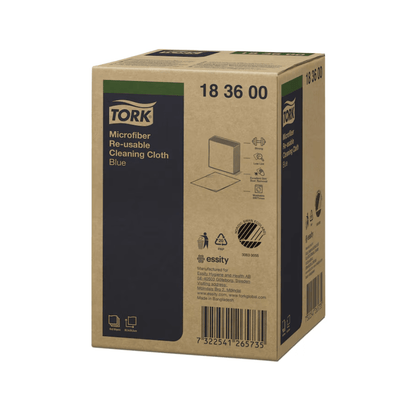 A box of reusable microfiber cleaning cloths from Tork in blue. The box displays product information, including the code 18 36 00 and the brand logos of TORK – Essity Professional Hygiene Germany GmbH. Additionally, there is a barcode and symbols indicating that the cloths are microfiber and reusable.