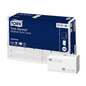 An image shows a pack of Tork Xpress® 150100 Multifold Hand Towels Universal H2, manufactured by TORK – Essity Professional Hygiene Germany GmbH. The blue and white packaging with the product code 15 01 00 emphasizes its excellent value for money. In front of the pack is a stack of these single-ply, foldable hand towels.