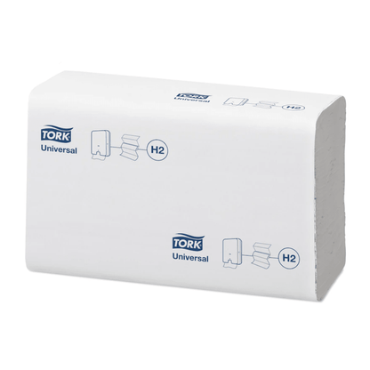 A stack of Tork Xpress® 150299 Multifold Hand Towels, wrapped in white packaging, displays the Tork logo and illustrations. The packaging emphasizes their compatibility with dispensers and offers, as part of the TORK range - Essity Professional Hygiene Germany GmbH, an impressive value for money.