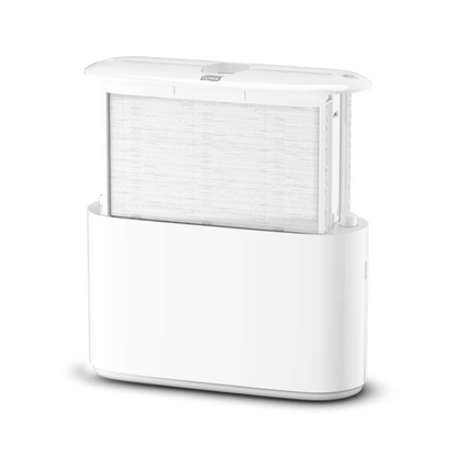 The Tork Xpress® 552200 Tabletop Dispenser for Multifold Hand Towels Elevation H2 from TORK - Essity Professional Hygiene Germany GmbH impresses with a sleek, minimalist design featuring a visible filter integrated into the base. The vertically positioned filter enhances the overall aesthetics, and the top is slightly open to demonstrate its efficient functionality.