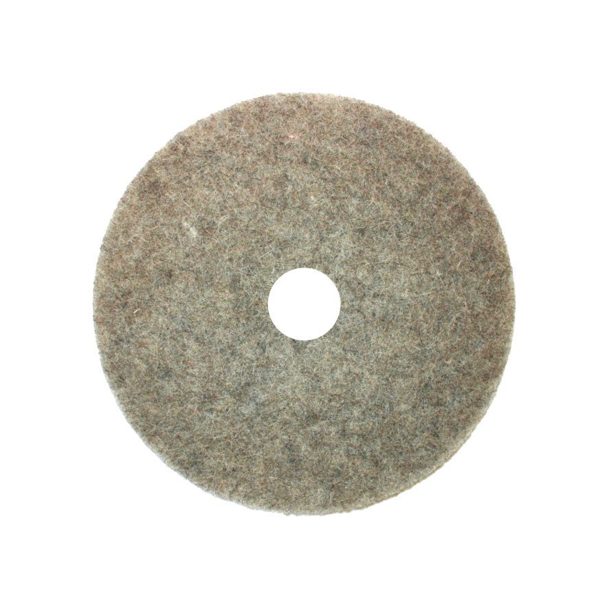 The Arcora Ultra-High-Speed Pad High-Gloss from Arcora International GmbH is a round, flat, gray pad with a center hole and slightly rough texture, ideal for high-gloss finishes on medium-hard to hard floor coatings.
