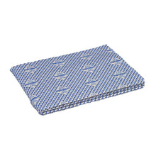 A piece of folded fabric with a blue geometric pattern with small animal prints, reflecting the design of the "Original Floorcloth" by Vileda Professional.