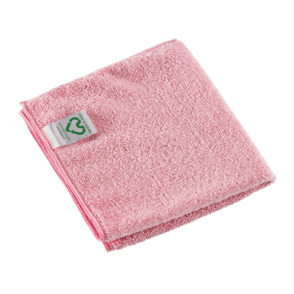 A folded pink Vileda Professional r-MicroTuff Swift microfiber cloth made from recycled material with a textured surface. In one corner, on a plain white background, there is a small white label featuring a green recycling symbol.