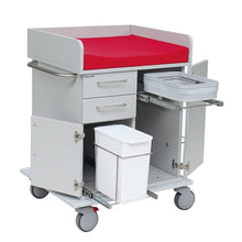 The Novocal changing trolley features a red, padded worktop, two drawers, two cabinets, a pull-out tray with a white waste bin, and a sliding tray that facilitates the transport of changing supplies. The trolley has four wheels and a full plastic plate chassis.