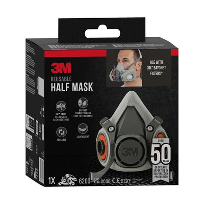 The 3M™ Half Mask Housing 6200 reusable, medium size by 3M Deutschland GmbH is depicted on the black-gray packaging with product image, 3M logo, application instructions and a person with a mask.