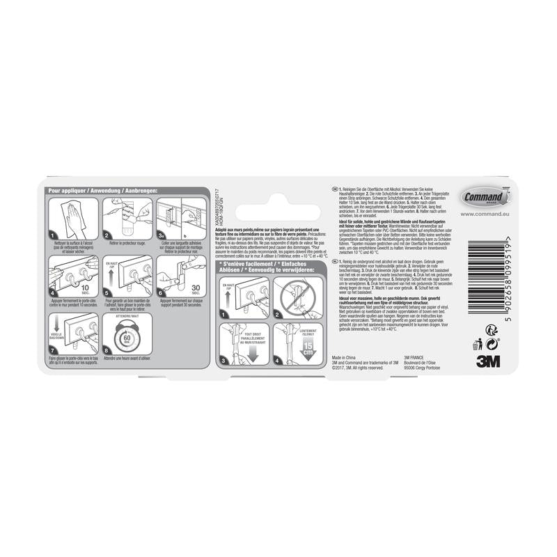 Backside of the Command™ key rail in quartz, HOM18-Q from 3M Deutschland GmbH with illustrated step-by-step installation instructions, multilingual notes, barcode, recycling symbols, and 3M trademark on a white background.