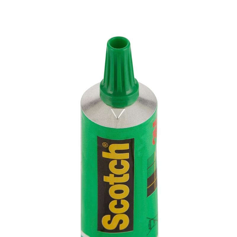 A close-up of an open tube of Scotch® liquid adhesive (30 ml, 3M Deutschland GmbH) shows the green nozzle and the black-and-green label. This strong adhesive ensures a reliable bond; it is available in packs of 24 tubes per display or as individual units.
