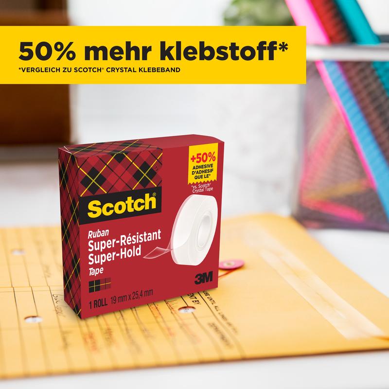 A box of Scotch® Super-Hold Secure Tape, 1 roll, 19 mm x 25.4 m (3M Deutschland GmbH), with red-green checkered packaging, lies next to a sealed Manila envelope. A yellow banner with the inscription "50% more adhesive*" is above the box.