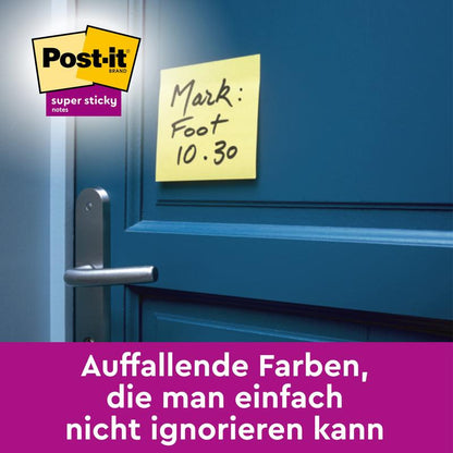 A yellow Post-it® Super Sticky Note (76 mm x 76 mm, 3M Deutschland GmbH) with the handwritten note "Mark: Foot 10.30" is placed above the handle on a blue door, the logo and German text are visible at the bottom of the image.
