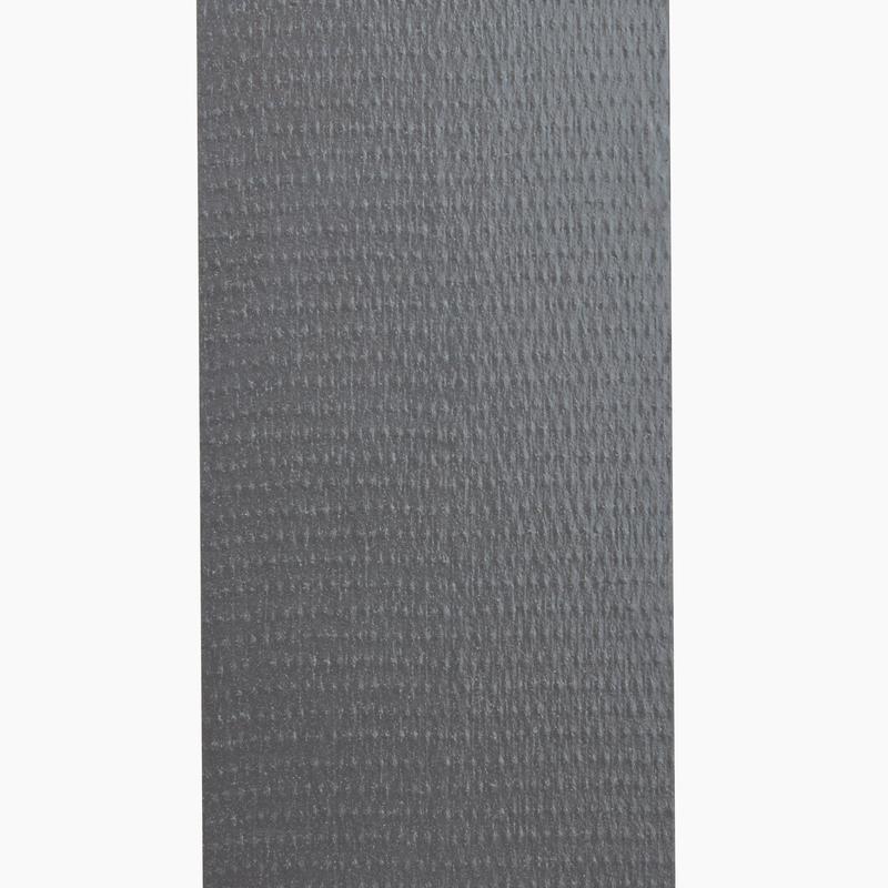 Close-up of a textured gray surface resembling the Scotch® Extremium™ No Residue High Performance Duct Tape (18.2 m x 48 mm) from 3M Deutschland GmbH, showing a grid-like pattern of small, evenly distributed bumps across the material.