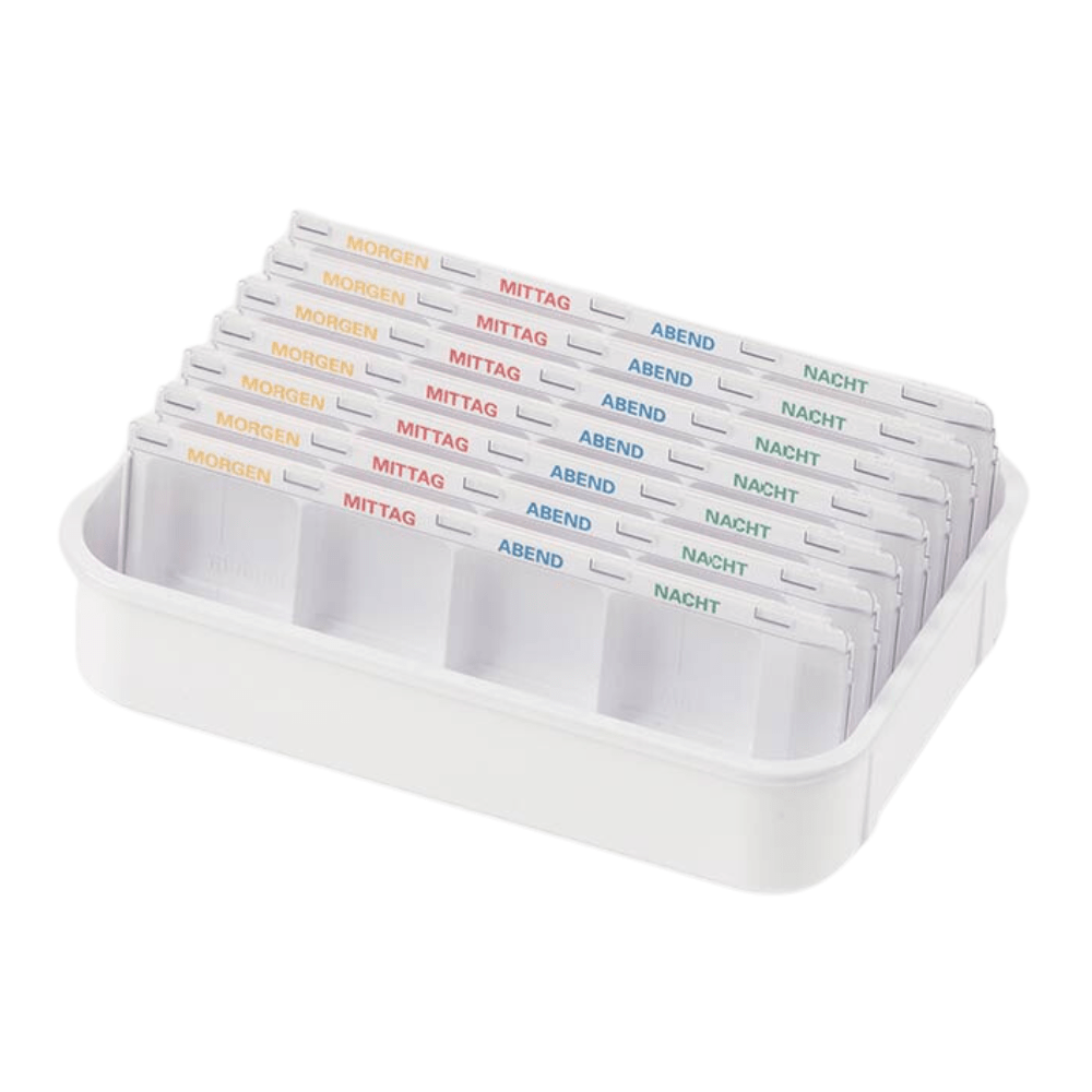 The melipul Dispenser-Tablett 7D-25 from Helmut Schwarz GmbH is a white pill dispenser that features multiple rows of compartments, each labeled with the German inscriptions "MORGEN", "MITTAG", "ABEND", and "NACHT". The labels are available in different colors, making it a practical reusable dispenser.