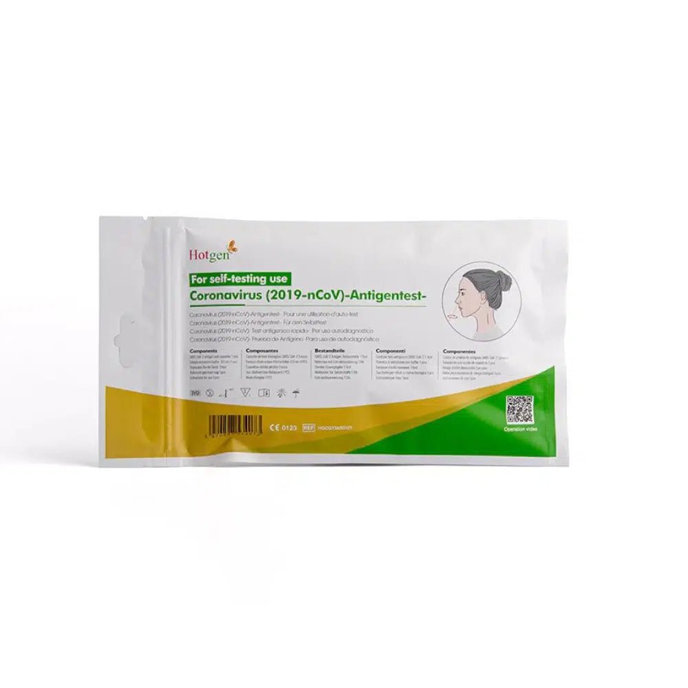 The Hotgen Sars-CoV-2 Antigen Layman's Rapid Test CE0123, a reliable self-test for detecting SARS-CoV-2, is characterized by distinctive green-yellow branding. The packaging features an image with instructions for the nasal swab on the front and is designed in multiple languages to ensure easy handling.