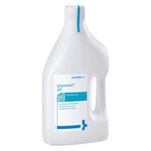 A bottle of Schülke gigasept® instru AF instrument disinfectant (aldehyde-free) from Schülke & Mayr GmbH, white with blue accents, for disinfecting medical instruments including endoscopes. The label contains text and a medical cross.